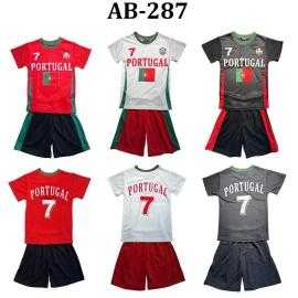 Boys Portugal football style set with white printed T-shirt and red shorts.