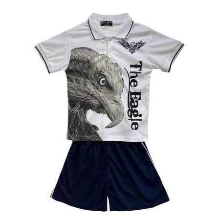 Ensemble garçon avec polo blanc imprimé aigle et short marine.