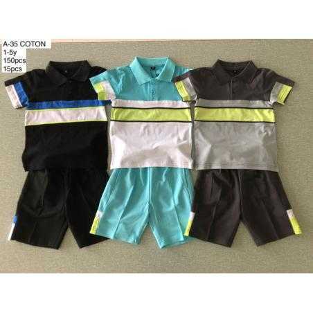 Ensemble garçon avec polo color block et short assorti en plusieurs coloris.